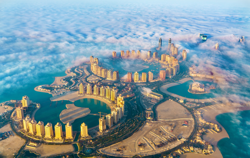 Aerial view of the Pearl-Qatar island in Doha through morning fog