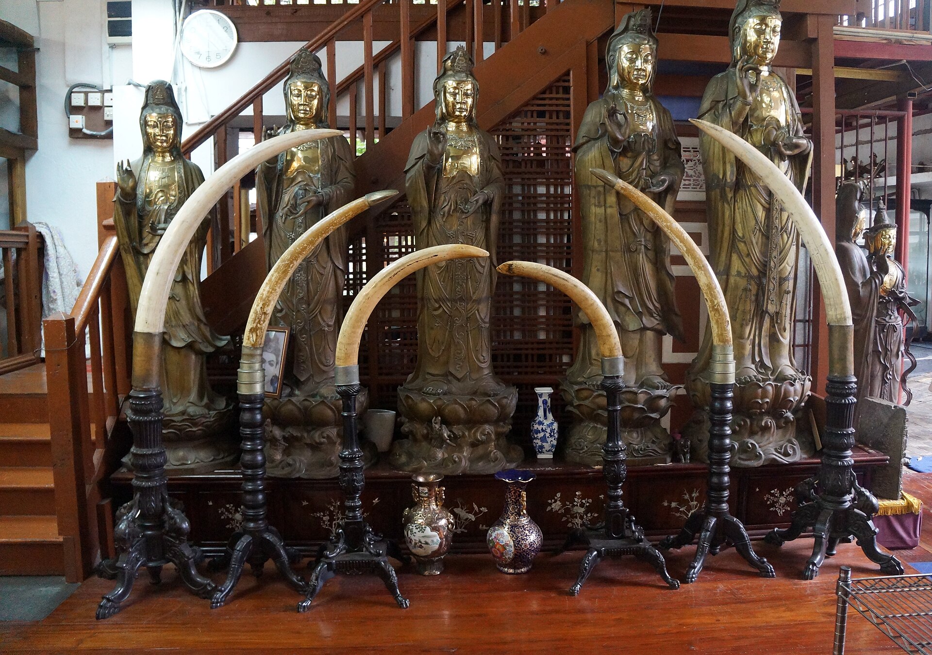 Ornate carvings and shrine buildings at the Gangaramaya Buddhist temple in Colombo