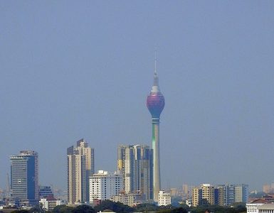 The Colombo skyline of high-rise towers seen across the water