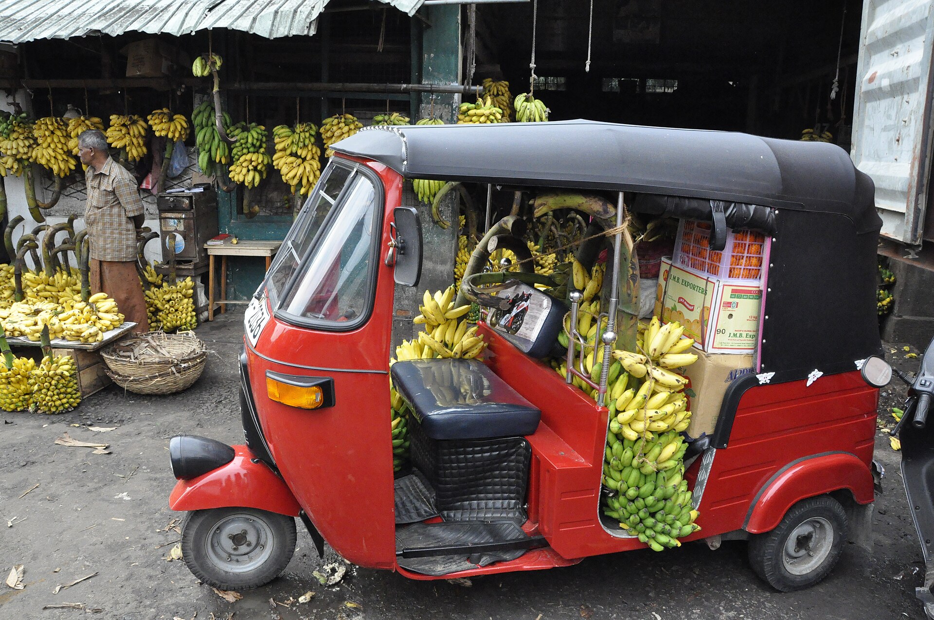 A three-wheeled auto rickshaw tuk-tuk on a street in Colombo, Sri Lanka
