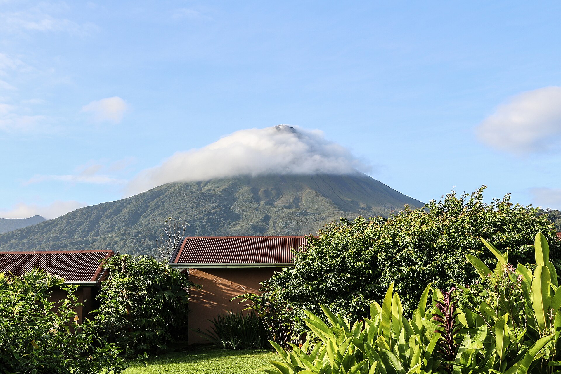 The cone of Arenal volcano rising above forest in northern Costa Rica