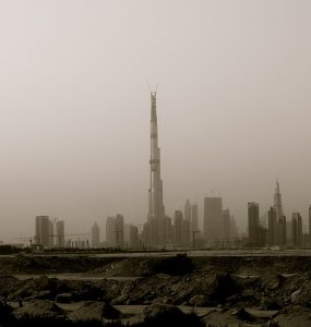 The Burj Khalifa rising above the Downtown Dubai skyline at dusk