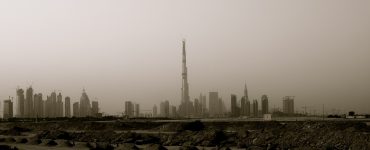 The Burj Khalifa rising above the Downtown Dubai skyline at dusk