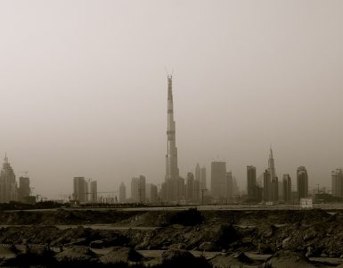 The Burj Khalifa rising above the Downtown Dubai skyline at dusk