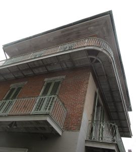 Historic street with iron balconies in the French Quarter, New Orleans