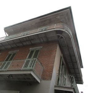 Historic street with iron balconies in the French Quarter, New Orleans