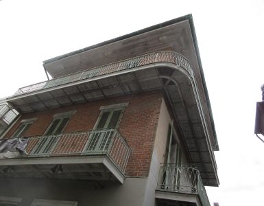 Historic street with iron balconies in the French Quarter, New Orleans
