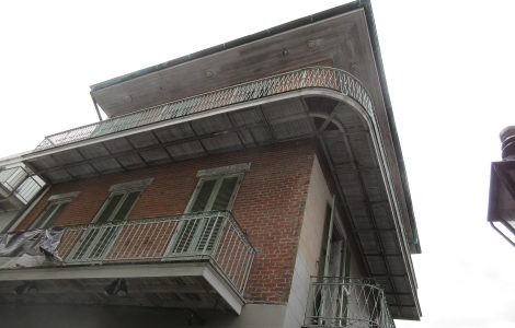 Historic street with iron balconies in the French Quarter, New Orleans