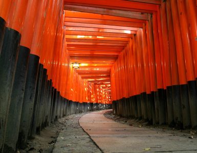 Rows of vermilion torii gates on the hillside path at Fushimi Inari shrine in southern Kyoto