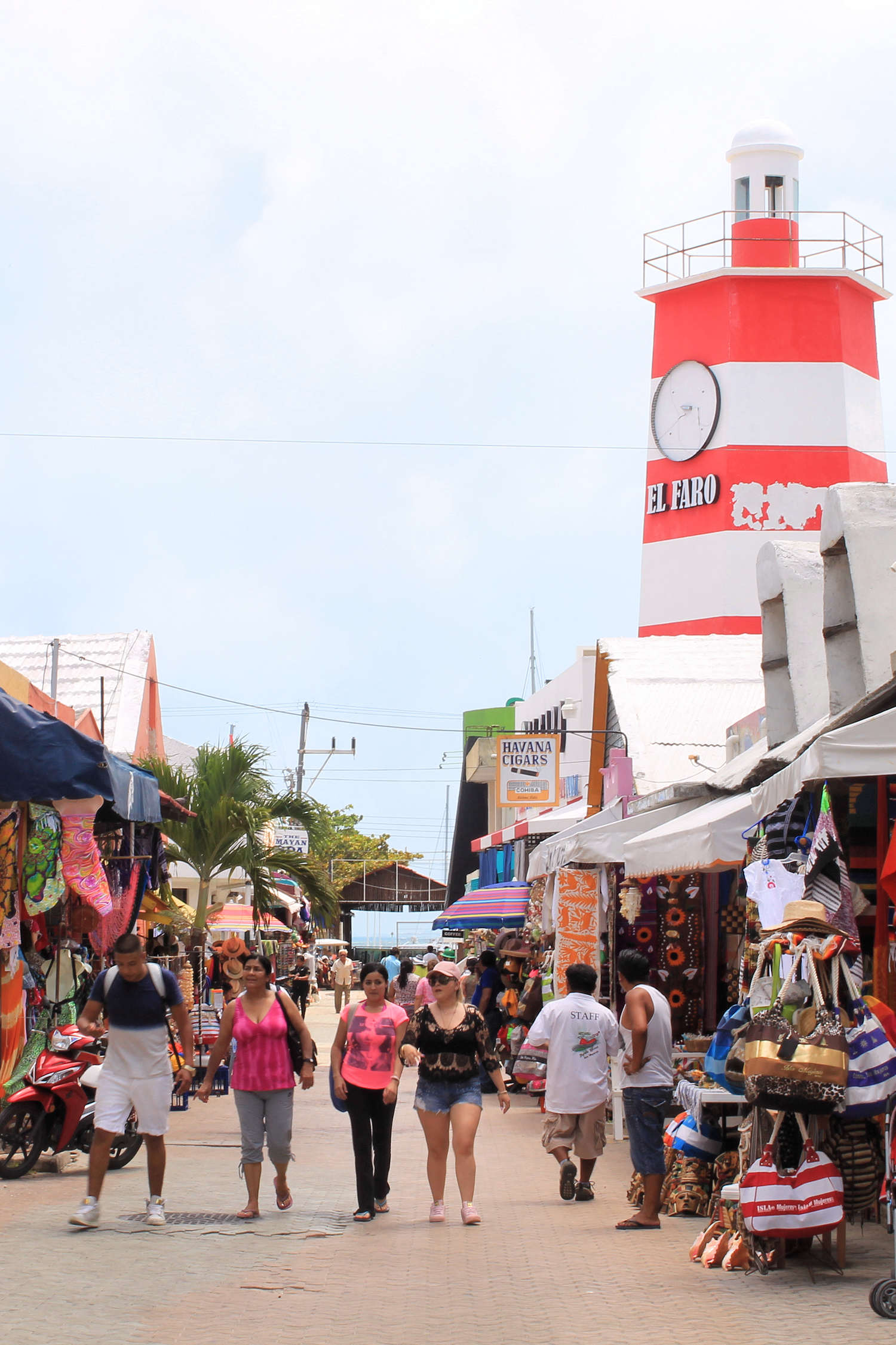 A quiet street on Isla Mujeres, where bikes and golf carts share the road with light traffic