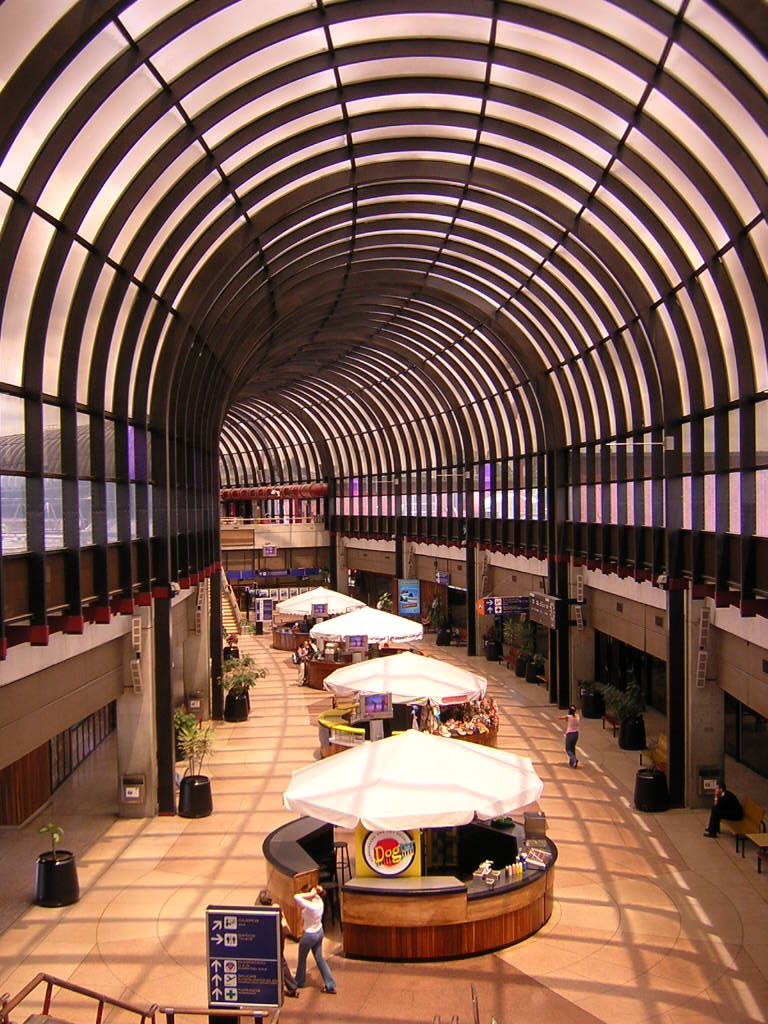 The arrivals hall at Jose Maria Cordova airport where transfer drivers wait