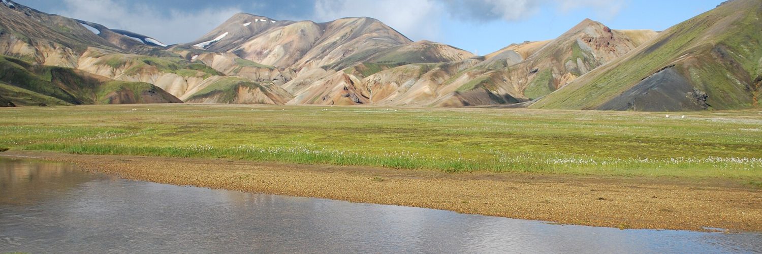 Coloured rhyolite mountains and hiking huts at Landmannalaugar in the Icelandic highlands