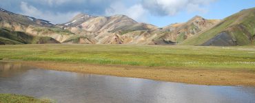 Coloured rhyolite mountains and hiking huts at Landmannalaugar in the Icelandic highlands