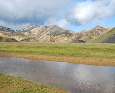 Coloured rhyolite mountains and hiking huts at Landmannalaugar in the Icelandic highlands