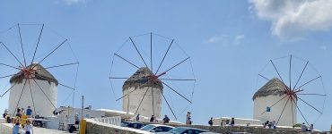The row of whitewashed windmills above Chora on Mykonos