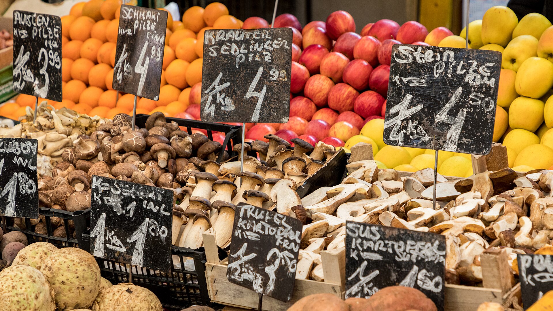 Food stalls along the Naschmarkt market street in Vienna