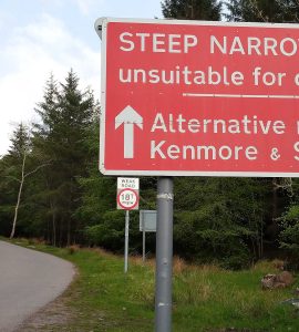 Road on the North Coast 500 route in the Scottish Highlands