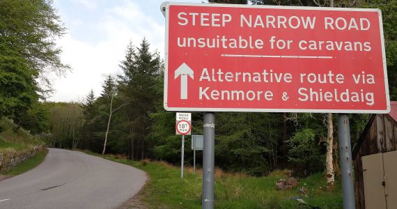 Road on the North Coast 500 route in the Scottish Highlands
