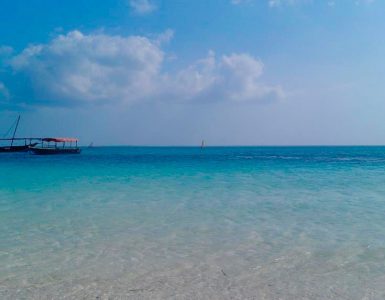 White sand and dhow boats at Nungwi beach in northern Zanzibar