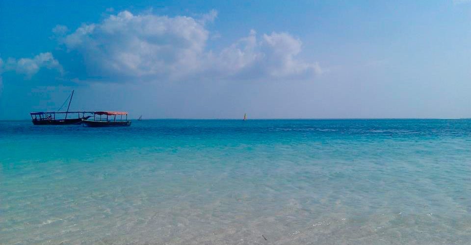 White sand and dhow boats at Nungwi beach in northern Zanzibar
