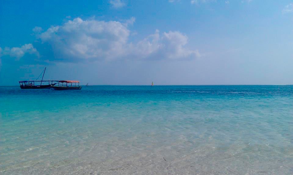 White sand and dhow boats at Nungwi beach in northern Zanzibar
