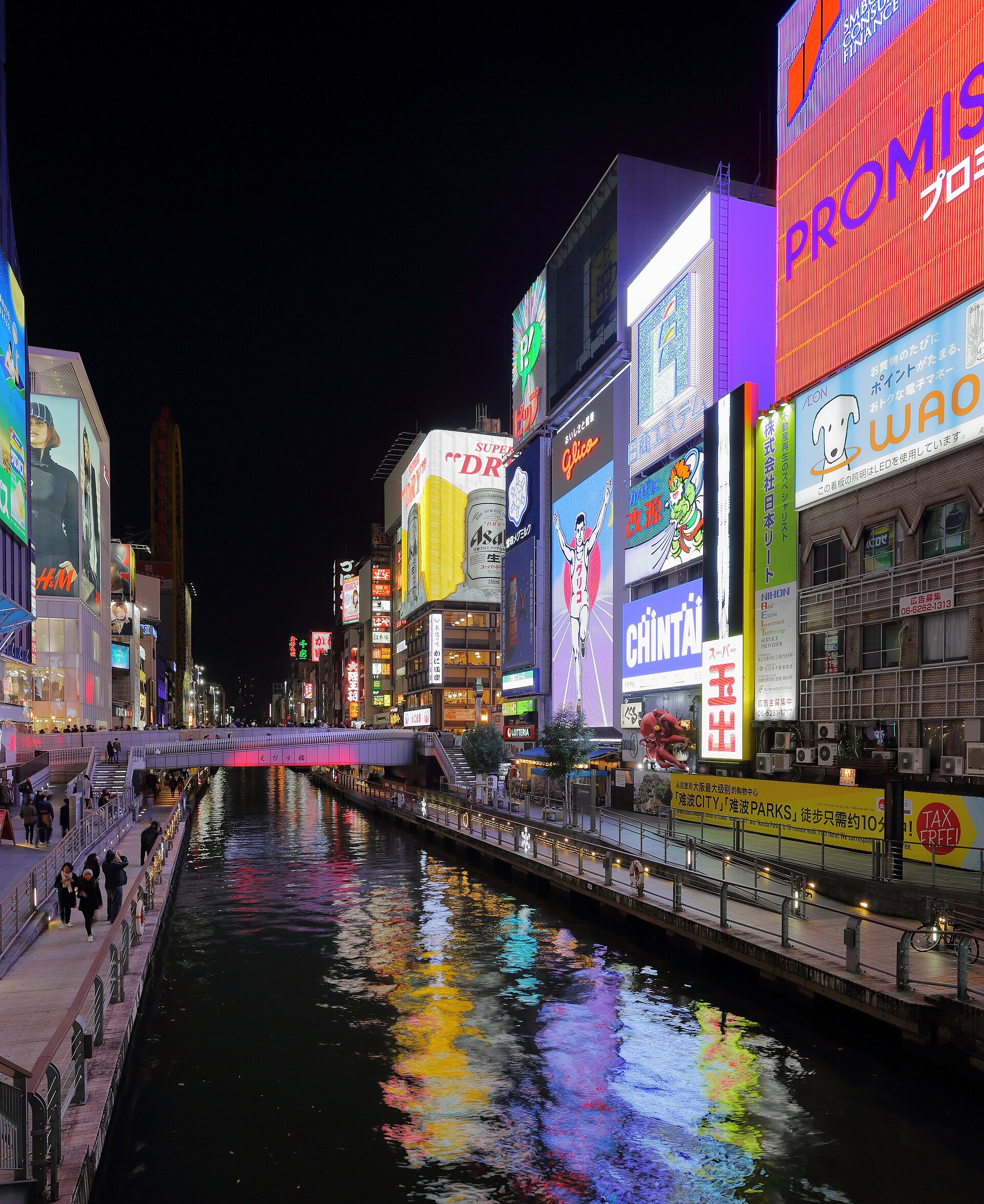 Neon signs reflected in the canal at Dotonbori in Osaka at night