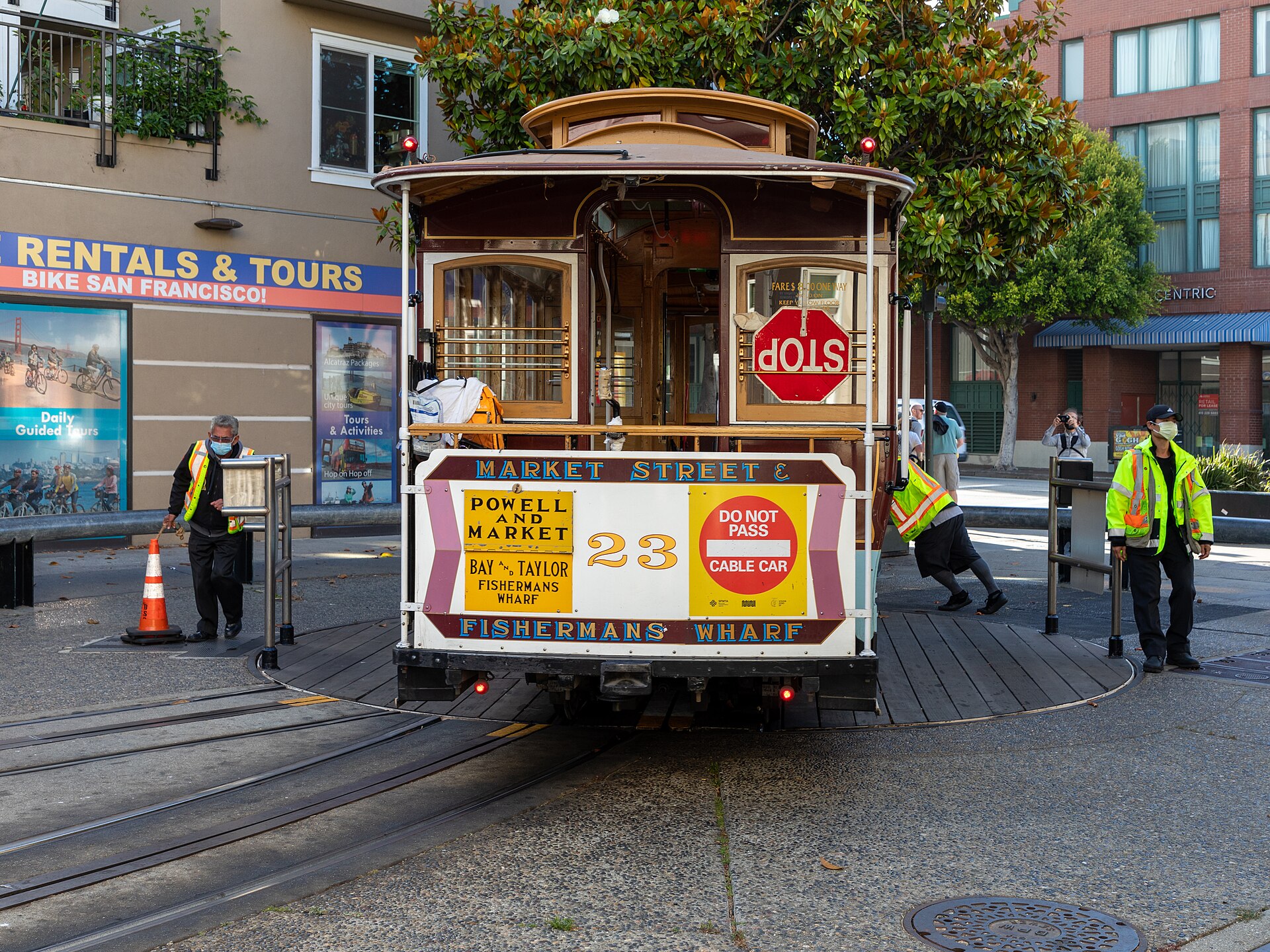 Powell-Mason cable car being turned by hand at the Powell Street turnaround in San Francisco