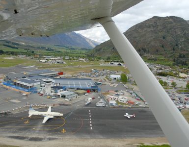 Aerial view of Queenstown Airport runway at Frankton beside Lake Wakatipu