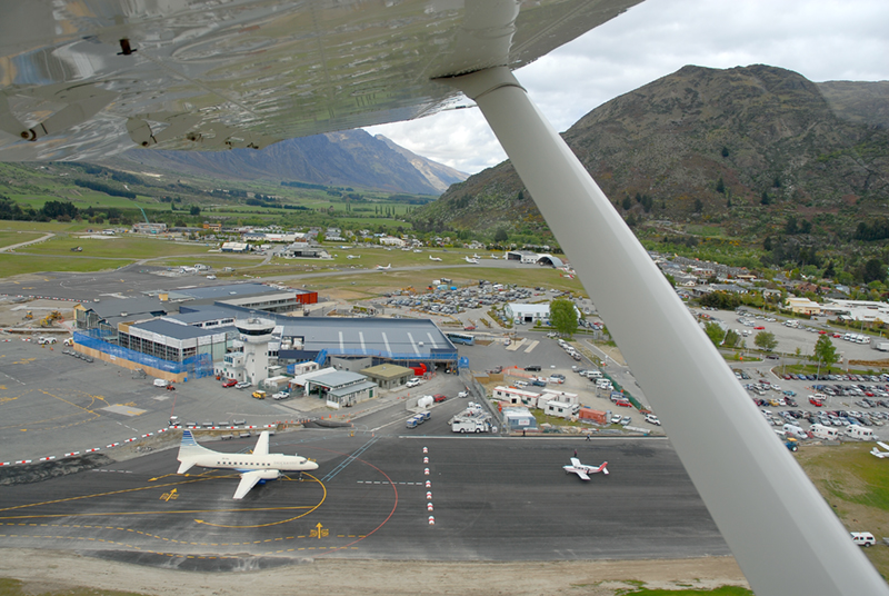Aerial view of Queenstown Airport runway at Frankton beside Lake Wakatipu