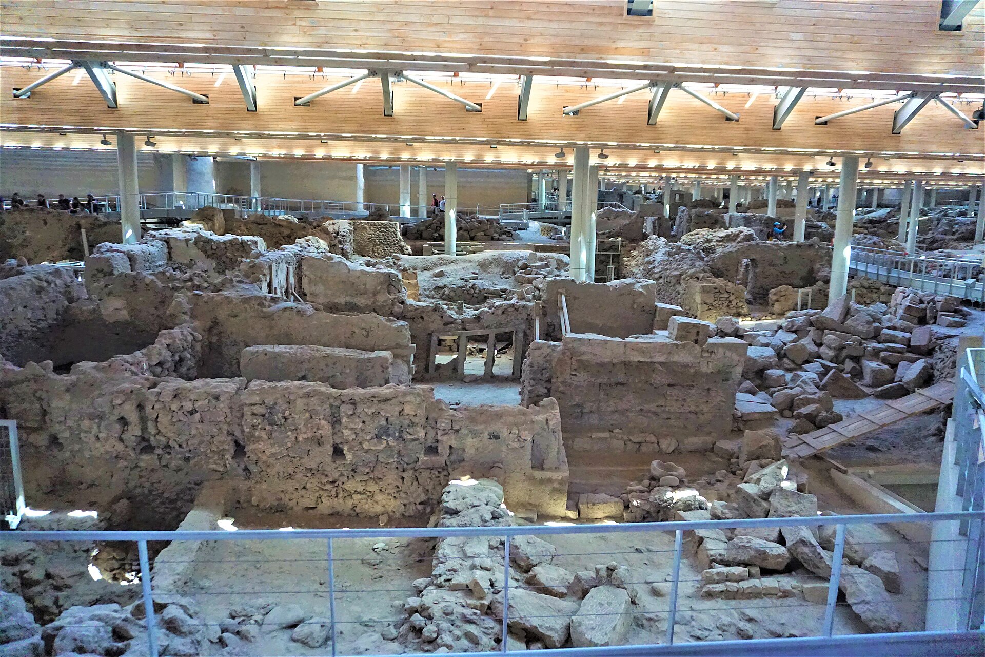Preserved Bronze Age streets and buildings under the shelter at the Akrotiri archaeological site, Santorini
