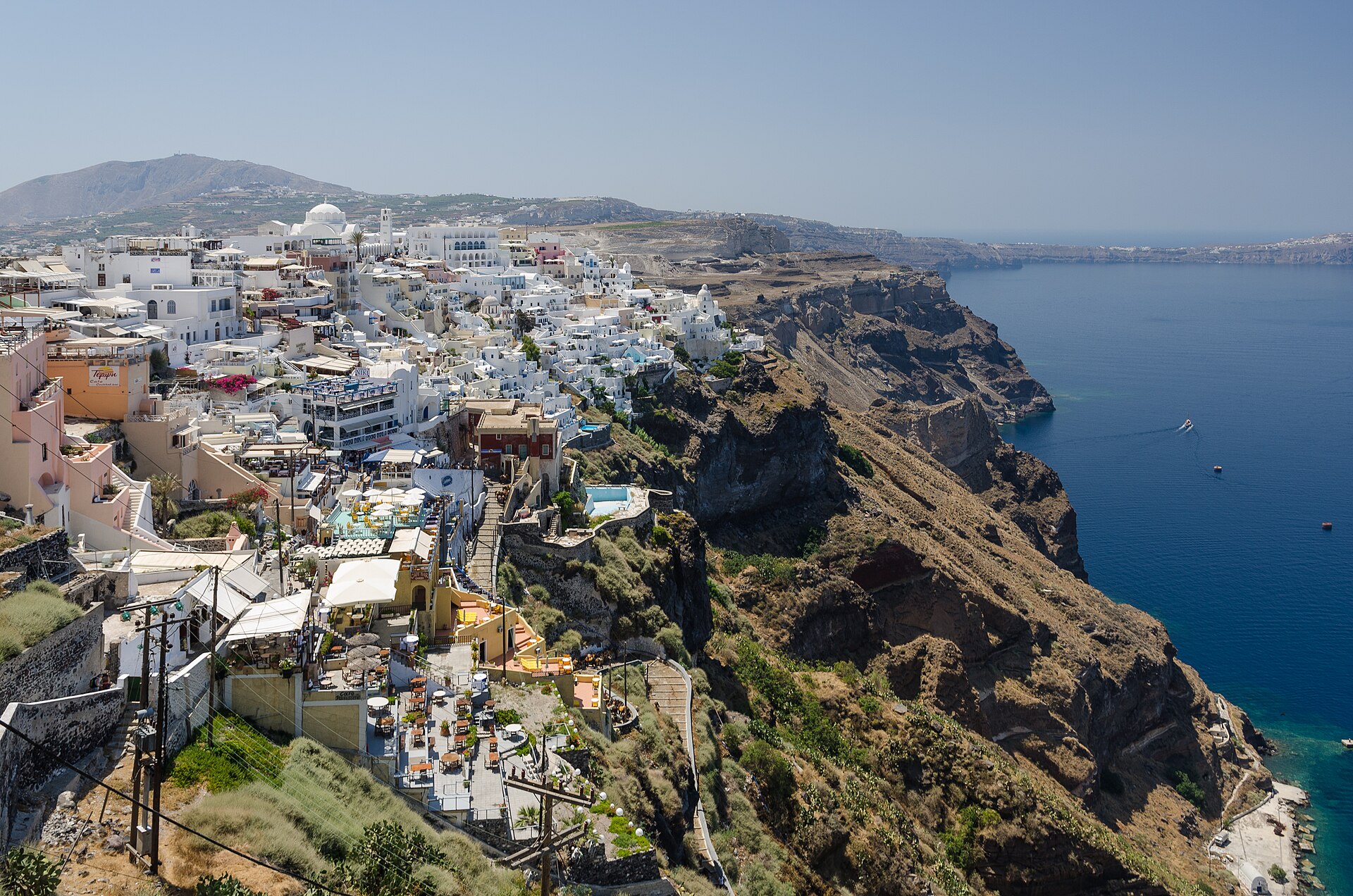 The town of Fira clinging to the crater rim above the Santorini caldera