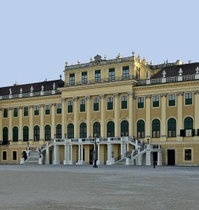 Schönbrunn Palace north facade in Vienna seen across the forecourt