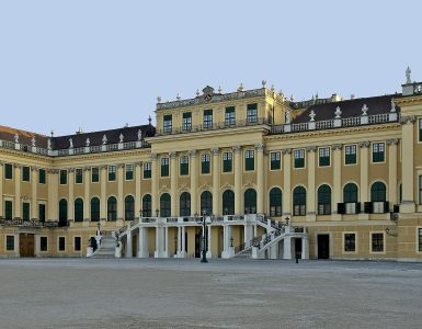 Schönbrunn Palace north facade in Vienna seen across the forecourt
