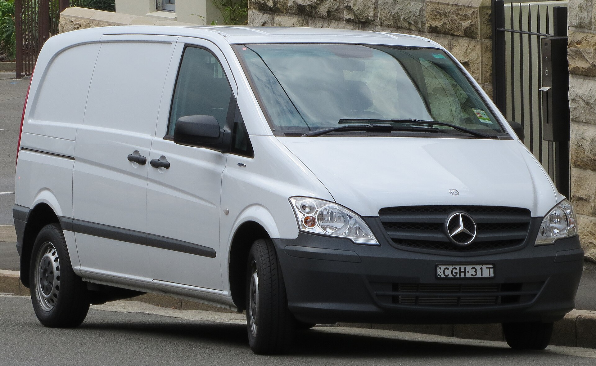 A seven-seat passenger van of the type commonly rented for family trips in Italy
