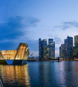 The Marina Bay skyline in Singapore at dusk with Marina Bay Sands on the right