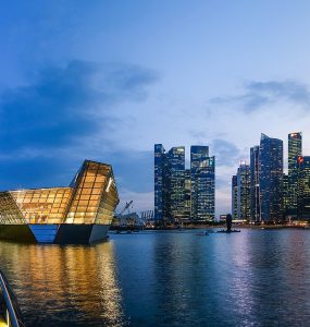The Marina Bay skyline in Singapore at dusk with Marina Bay Sands on the right