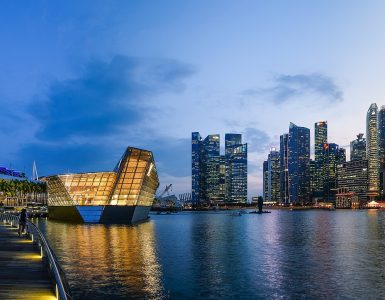 The Marina Bay skyline in Singapore at dusk with Marina Bay Sands on the right