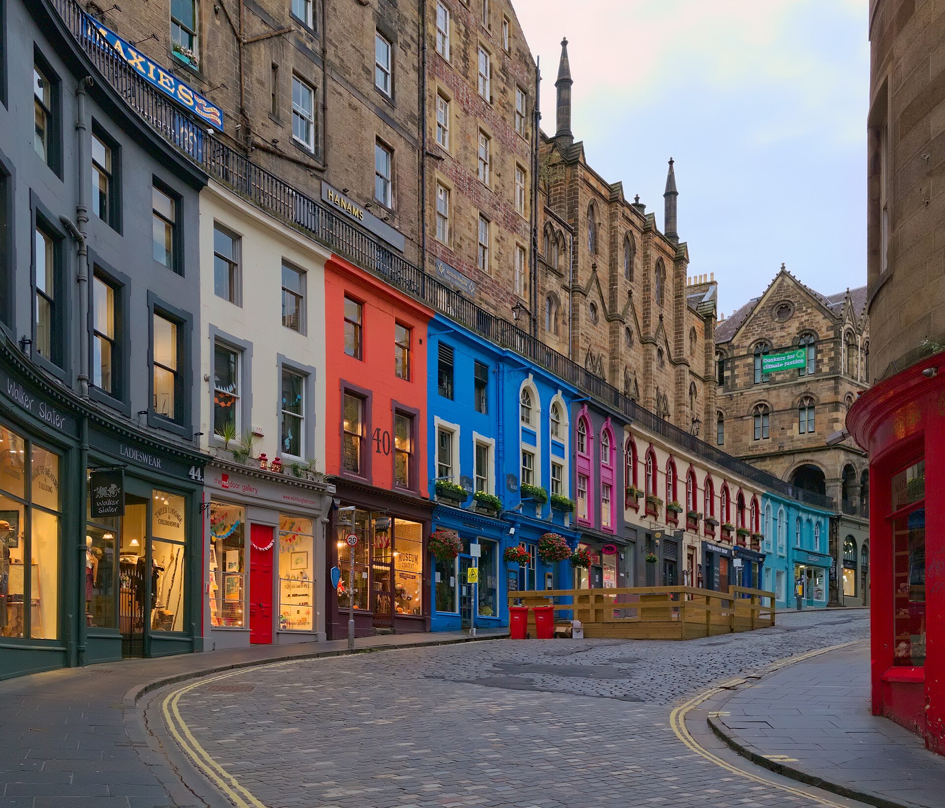 The curved, colourful shopfronts of Victoria Street in Edinburgh's Old Town