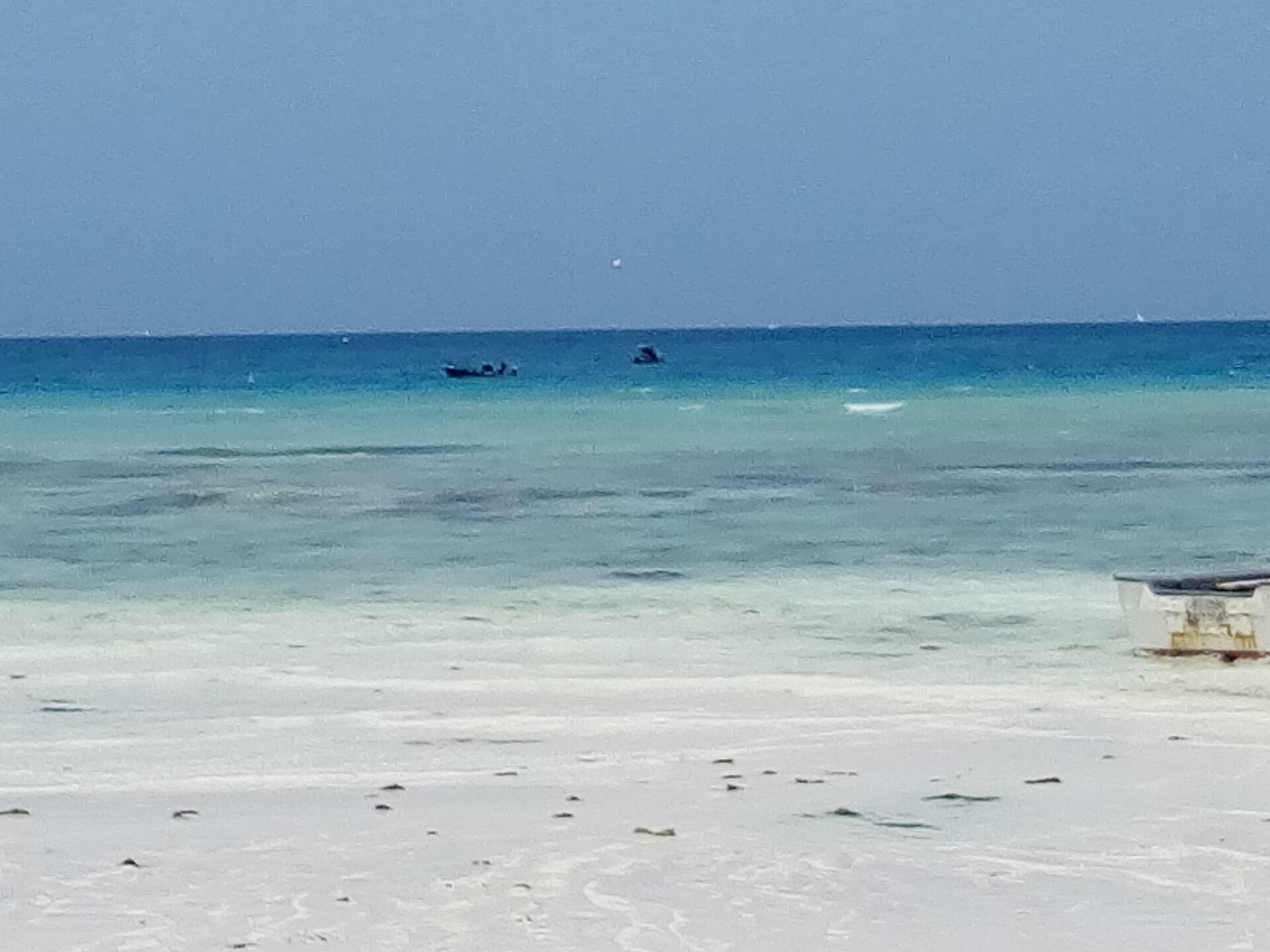 White sand and dhow boats on the beach at Nungwi in northern Zanzibar