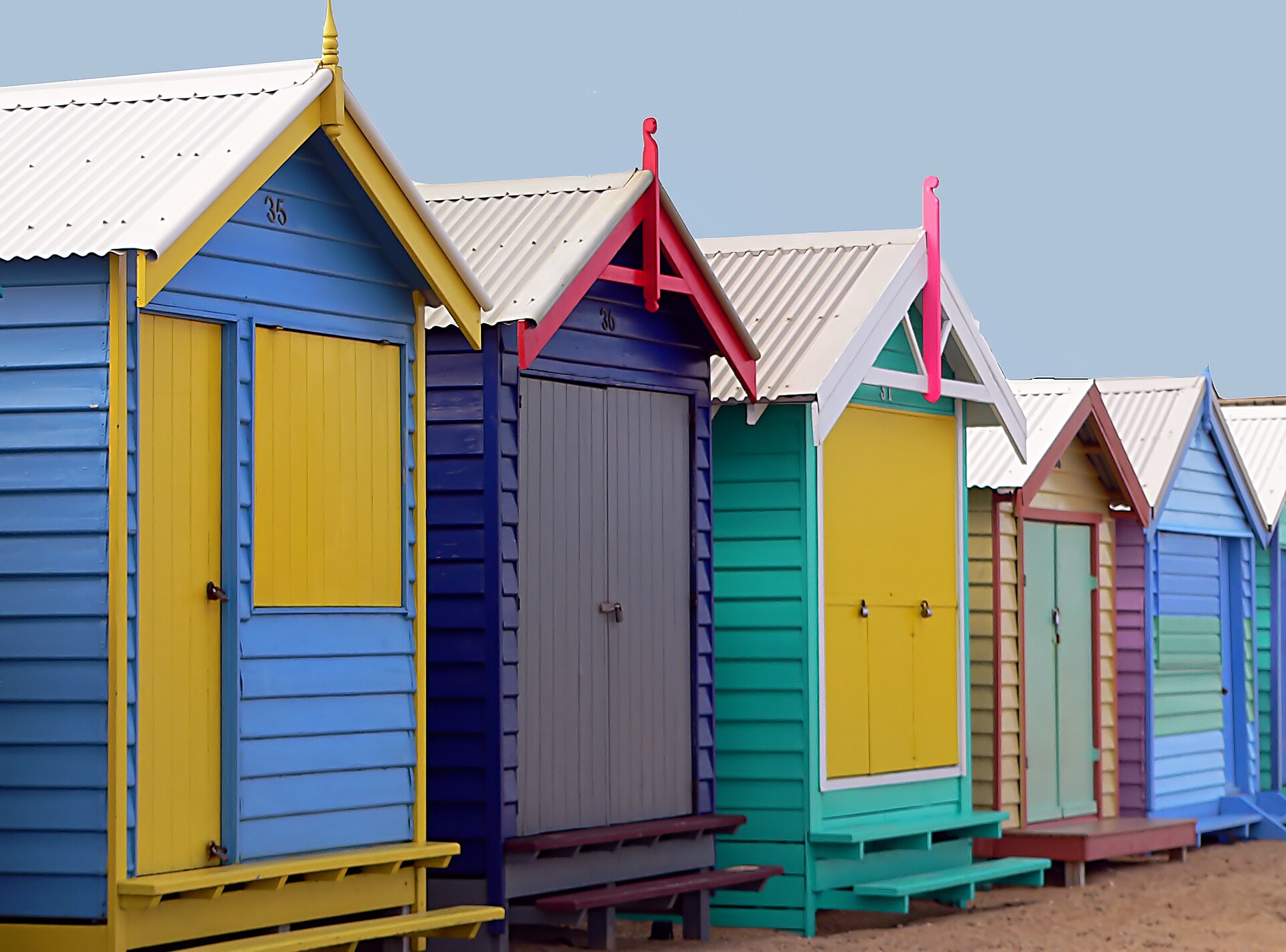 Row of painted bathing boxes on Brighton Beach near Melbourne