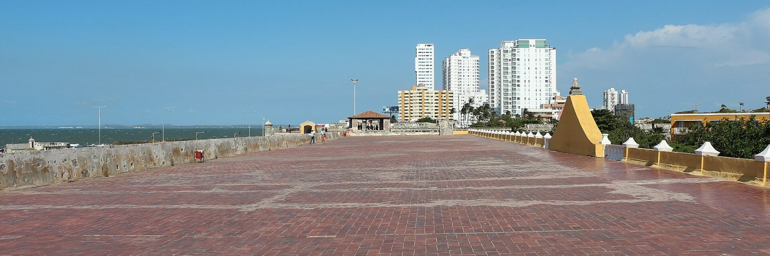 Walkway along the top of the old city walls in Cartagena at dusk