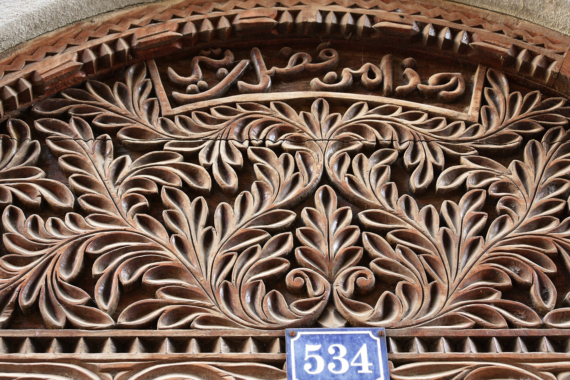 A traditional carved wooden door in Stone Town, Zanzibar