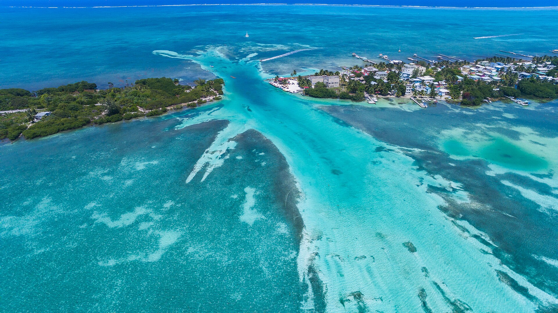Aerial view of Caye Caulker island and its reef in Belize
