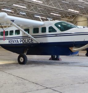 A Cessna 208 Caravan, the same aircraft type used on most Kenyan safari routes, parked at Nairobi's Wilson Airport