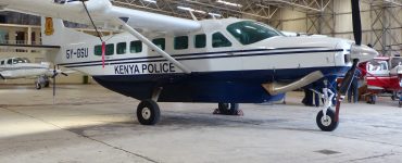 A Cessna 208 Caravan, the same aircraft type used on most Kenyan safari routes, parked at Nairobi's Wilson Airport