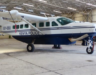 A Cessna 208 Caravan, the same aircraft type used on most Kenyan safari routes, parked at Nairobi's Wilson Airport