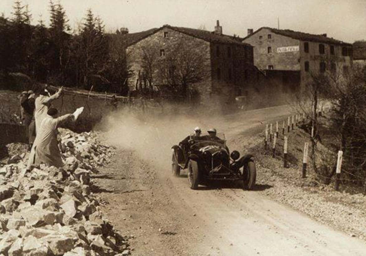 A 1932 Mille Miglia racing car climbing the Passo della Futa in the Apennines above Bologna