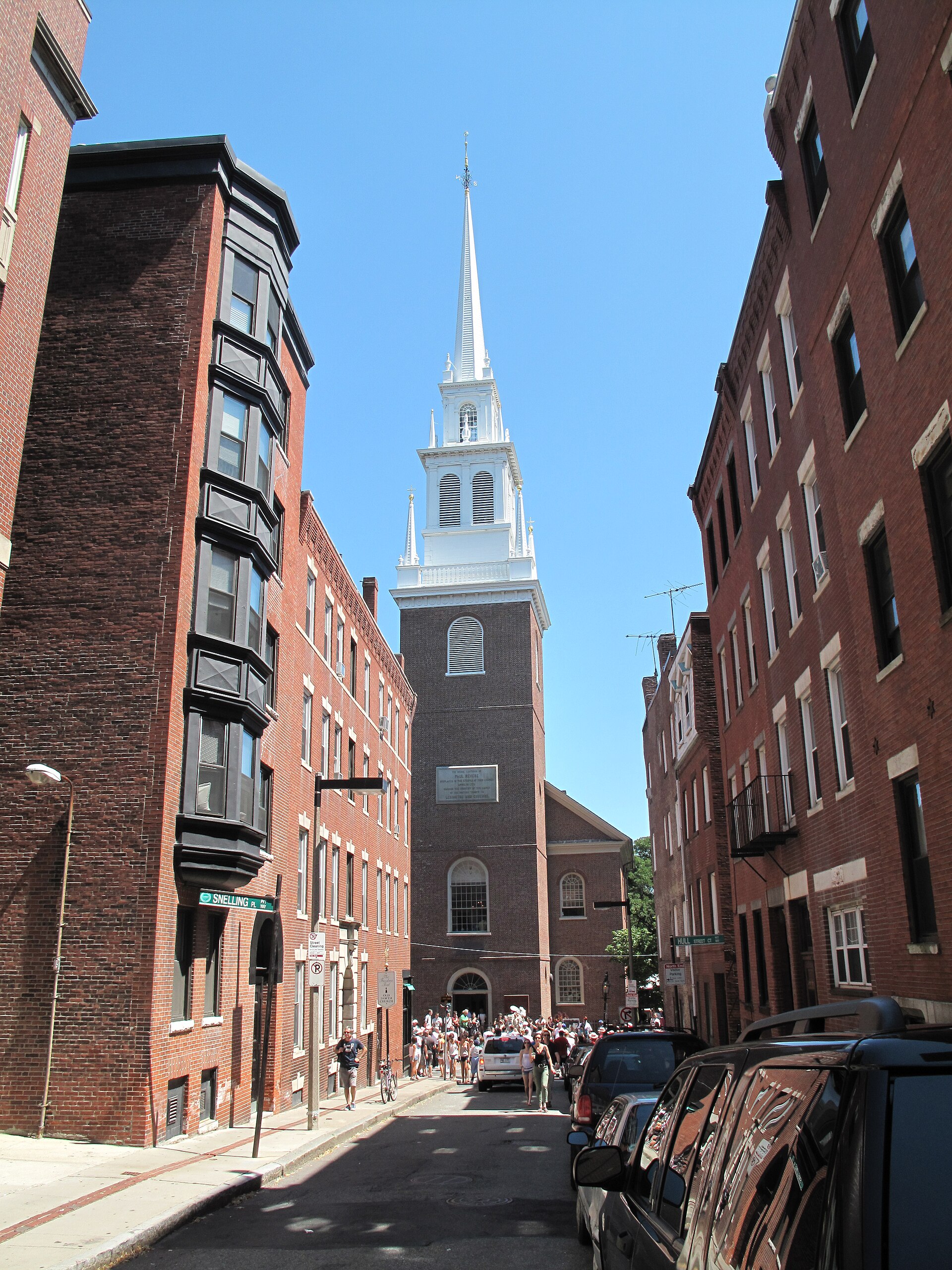 The white steeple of the Old North Church rising above the brick rooftops of Boston's North End