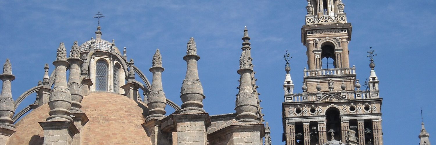 Seville Cathedral and the Giralda bell tower seen from the street