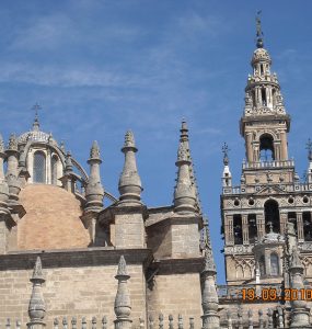 Seville Cathedral and the Giralda bell tower seen from the street